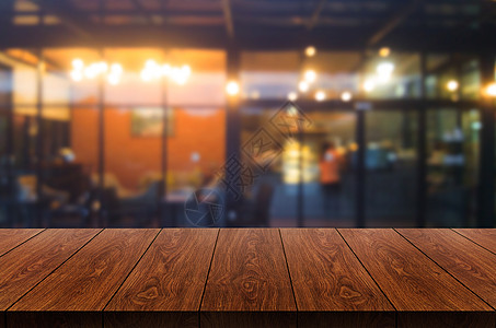 现代餐馆背景模糊的木板餐桌桌子嘲笑柜台木器餐厅商业厨房木头咖啡食物图片