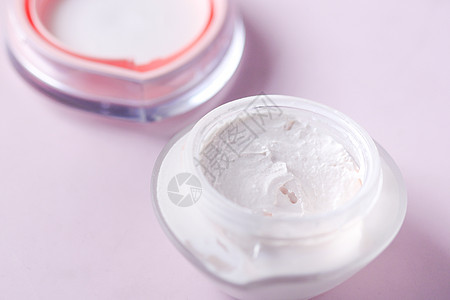 在粉红色容器里 紧贴的美容霜产品治疗女性奶油生物润肤卫生液体皮肤科奶油状图片