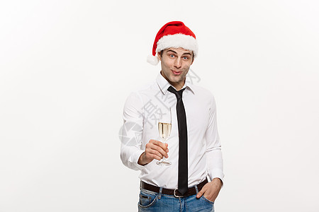 圣诞节概念英俊的商务人士庆祝圣诞快乐和新年快乐戴圣诞帽和香槟杯商务团体男性盒子展示传统帽子娱乐玻璃朋友图片