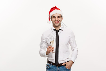 圣诞节概念英俊的商务人士庆祝圣诞快乐和新年快乐戴圣诞帽和香槟杯办公室礼物团体工作假期男人派对公司香槟工人图片