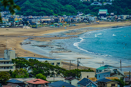 卡马库拉镇风和蓝天市容居住区城市波浪状天空古都海洋景观海滩长势图片