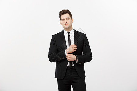 商业概念 帅哥快乐笑的年轻帅哥穿智能西装 穿着孤立的灰色背景姿势成人经理衬衫快乐工人套装工作室时尚商务图片