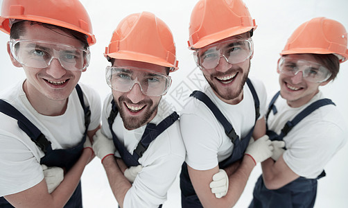 一组专业工业工人 他们互相结识技术员联盟女性生产建设者职业服务修理工男性微笑图片
