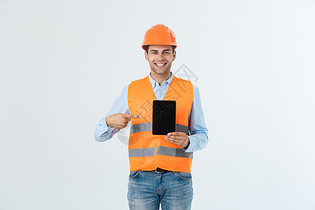 年轻建筑工人在白色背景的硬帽上快乐地工作成人安全帽领班男人商业商务建设者承包商工程建筑师图片