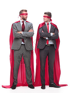 两位超级英雄的商务人士互相看着对方 彼此对视公司领导商务伙伴英雄专注红色男人人士商业图片