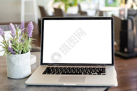 现代办公室的膝上型计算机和招贴宣传画工作空间背景互联网监视器工作室桌子边界男人小样网络技术键盘图片