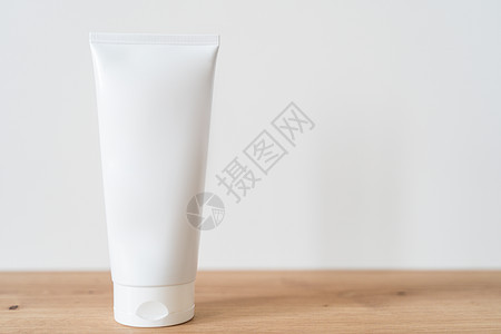 白管奶油模型在木制桌子上生态包装皮肤木板卫生温泉广告瓶子身体化妆品图片