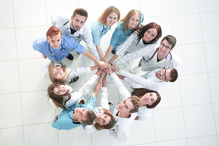 站在年轻医疗同事面前的自信和自信的头顶上卫生保健工人领导者职业蓝色学生医院成功心脏病图片