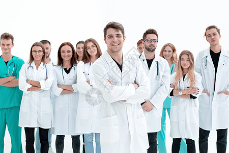 男医生站在一群医科学生的面前站着教育会议长袍卫生女性团队医务人员儿科保健职业图片