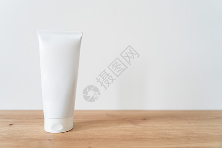 白管奶油模型在木制桌子上推介会广告品牌浴室木头护理洗剂凝胶生态木板图片