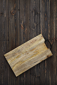 用木板上黑木木背景的木板切割板手工粮食托盘餐具木头产品厨房食物乡村工具图片