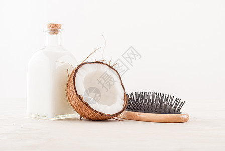 白底椰子油的头发理发护理概念按摩奶油坚果治疗皮肤情调黄油洗澡面具营养图片