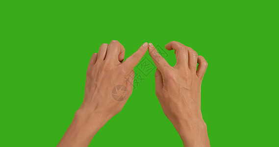 女性手 绿色背景上的爱的象征 绿屏幕图片