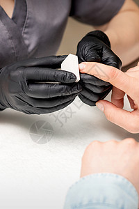 美甲师用指甲锉做美甲程序沙龙毛巾美容抛光成人客户备案呵护美容师图片