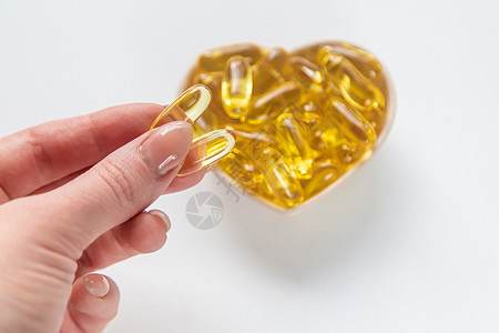 Omega 3号胶囊 鱼脂肪 自然 有选择的焦点药店药片金子鳕鱼食物药物制药治疗凝胶营养图片