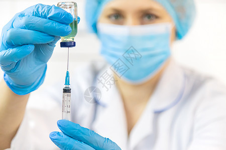 医生用注射器填充药物 闭合 疫苗接种和免疫 有选择的焦点治愈小瓶护士医院实验室胰岛素药品流感生物学抗生素图片