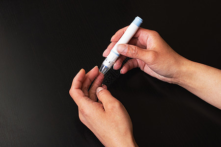 解除装置刺穿手指的缝合研究医院诊断抗体控制仪表乐器感染葡萄糖糖尿病图片