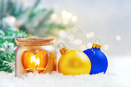 美丽的圣诞节背景和装饰 有选择性的焦点星星季节场景蜡烛辉光房子庆典装饰品蓝色问候语图片