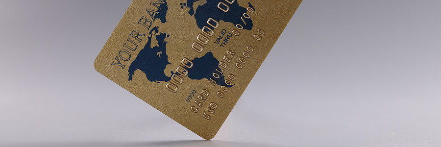 灰色背景的信用塑料银行卡销售量购物零售借方地球数字货币银行金融安全图片