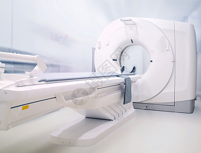 多探测器CT扫描仪(计算地形成像) 在模糊的医院房间背景上背景图片