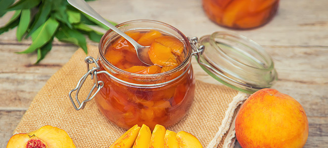 保存桃果酱 有选择的焦点 食物空白健康桃子花园季节叶子玻璃烹饪营养勺子图片