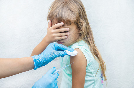 医生给孩子注射手臂 有选择的专注点护士医院抗生素感染免疫病人治疗疾病流感家庭图片