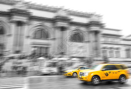 纽约市大都会博物馆黄色出租车 黑色和白色Tonning与运动模糊效果的电动车博物馆建筑城市假期地标街道旅行运输黑与白交通图片