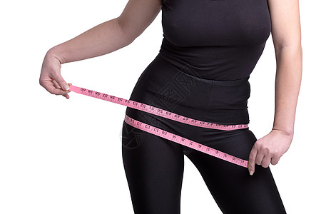 女人看到饮食的结果 然后损失了几磅外的重量数字身体仪表厘米肚子成人组织营养卷尺腹部图片