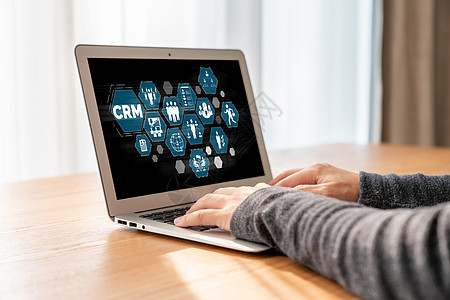 用于 CRM 业务的现代计算机上的客户关系管理系统按钮监视器小样品牌流程销售量数据男人商务职场图片