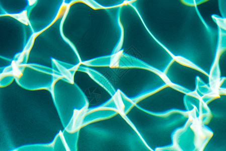 游泳池中绿化水面表面的日光霜文字绿色游泳波浪水池假期耀斑液体图片