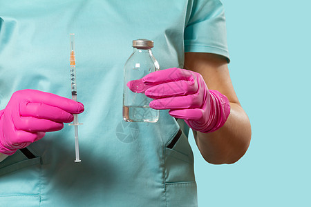 塑料注射器和液体药品瓶子在手静脉胶囊剂量化学免疫玻璃治疗疾病药物手套图片