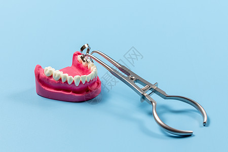 一套用于牙齿牙科护理的金属牙牙床工具喷射器矫正牙医卫生橡皮夹钳医疗探险家治疗乐器图片