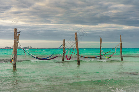 在加勒比海 墨西哥 Hammocks挂在柱子上吊床全景太阳可可热带海景海滩别墅蓝色孤独图片