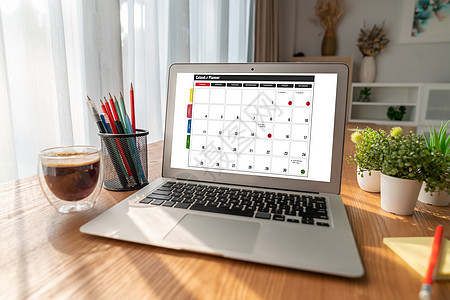 计算机软件应用日历 用于Modish计划时间表规划监视器议程桌子电脑展示备忘录日程男人活动技术图片