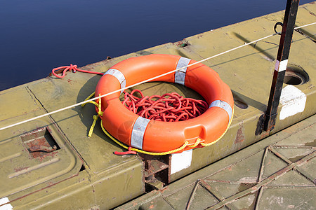河岸密闭处的橘子星环工作生活游艇邮政危险死亡码头海滩救生员安全图片