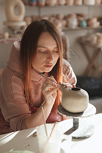 专业的波特工作创造力作坊雕塑家装潢手工女士职业手工业闲暇茶壶图片