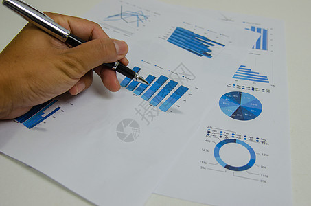 商业文件图表和图表财务统计与笔 文书工作报告图表投资和分析信息会计营销计划概念利润会议贸易项目报告预算办公室基准战略生长图片