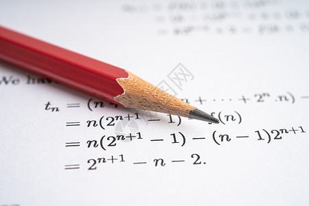 在教育学校用数学公式练习试卷纸写上笔记科学桌子解决方案笔记本学生理论工作班级学习知识图片