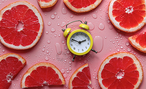 时钟和柑橘夏季时间概念 有选择的焦点柚子横幅幸福橙子食物饮食警报早餐水果薄荷图片