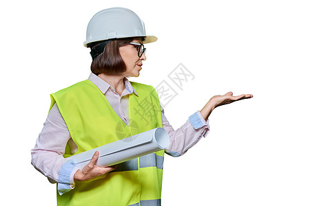 戴防护头盔的妇女将手指指向文字的发音位置黄色商业背心建筑师工程女士文本蓝图白色手势图片