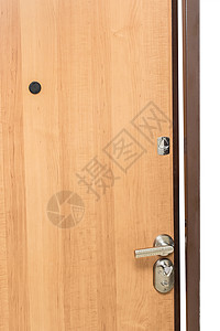 配有铁把手 钥匙锁洞和眼孔的木制门门入口装饰品锁孔木头眼睛安全房间古董建筑房子视孔图片