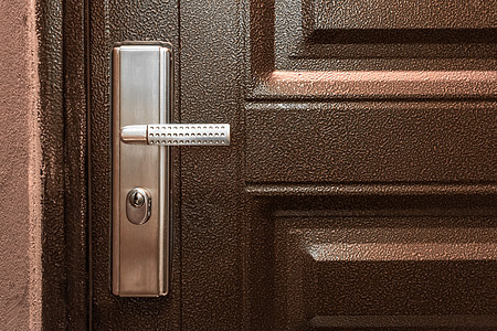 开放或特写出入口的钢门把手关上房门闭合闩锁金属入口建筑学合金公寓安全出口隐私门把手图片