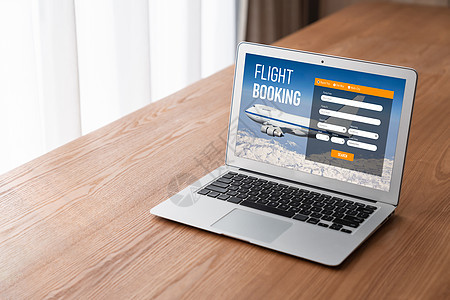 在线航班预订网站提供现代订票系统 n航空公司药片笔记本商业监视器屏幕电脑运输桌子旅游图片