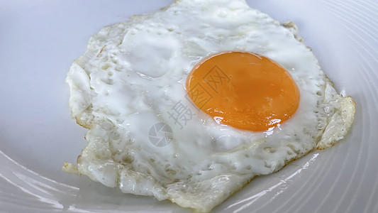 早餐吃即食炒鸡蛋熏肉带子食物橙子美食晚餐吃饭盘子午餐桌子图片