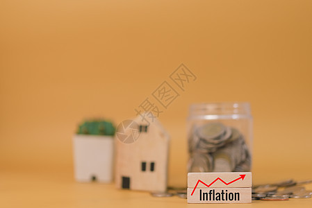 储蓄金融通货膨胀投资经济和保险家庭现金预算业务概念黄色背景图片