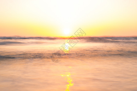 海水表面海面假期日落海洋蓝色海滩环境反射火花太阳背景图片