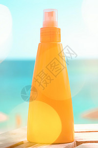 保护沙滩上的皮肤日光浴塑料晒黑晴天洗剂护理假期美容液化妆品奢华图片
