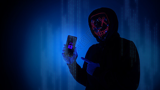 数字安全概念 隐形黑客戴着智能手机面具的匿名黑客机密技术人脸电脑扫描人士密码商业互联网屏幕图片