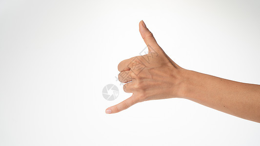 女人的手势 向冲浪者致敬 拇指和小手指挥舞背景图片