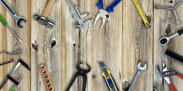 工作工具集卡尺卷尺木质锤子扳手材料木工维修横幅手工具图片